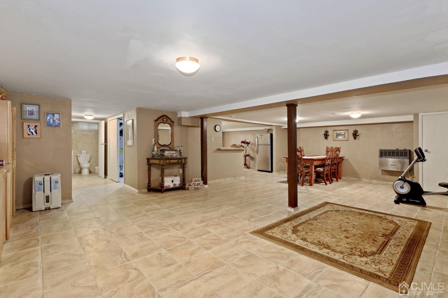 53 Helmetta Road Monroe Township, NJ 08831 - Photo 15 of 30 a view of a room with gym equipment