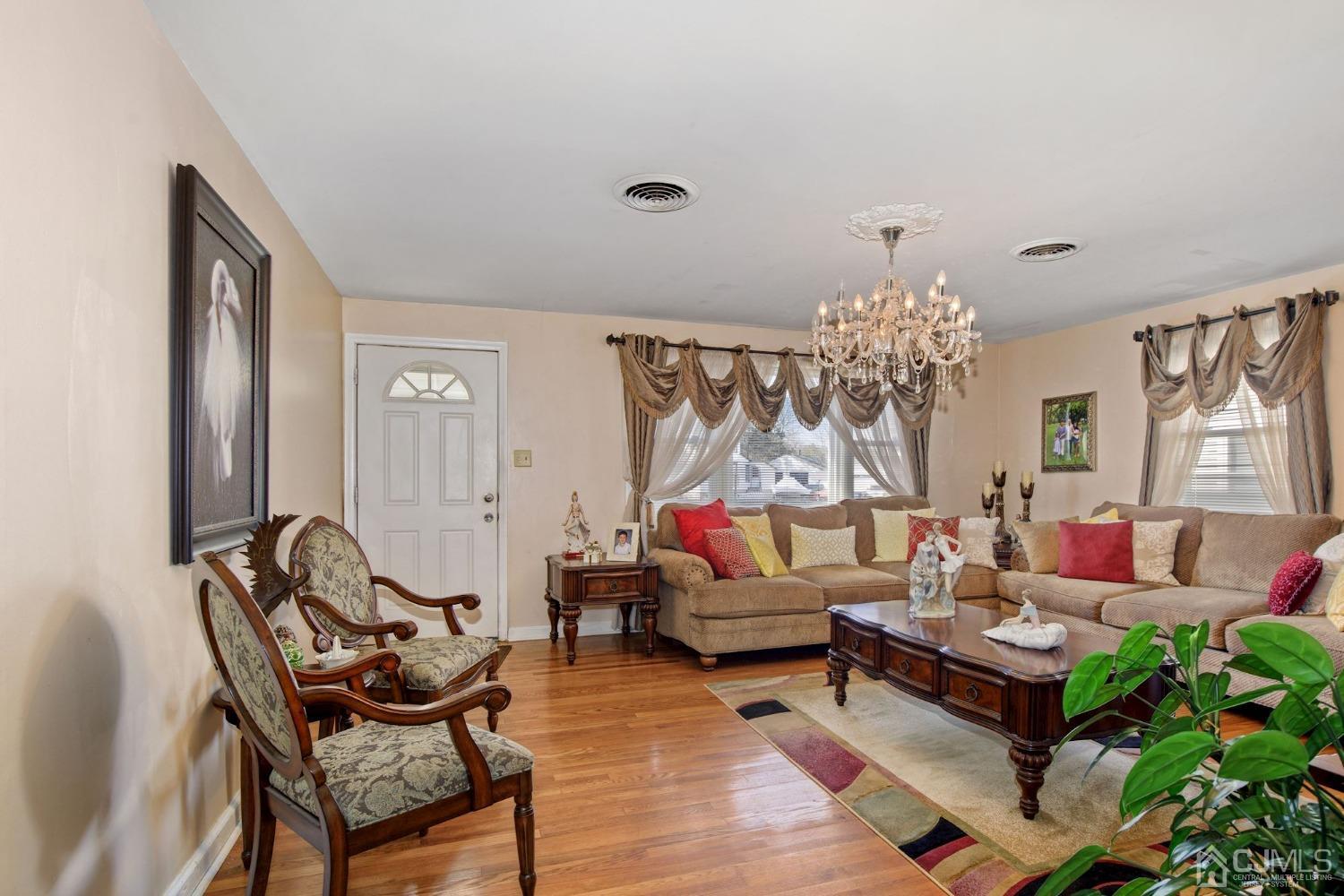 53 Helmetta Road Monroe Township, NJ 08831 - Photo 7 of 30 a living room with furniture and a large window