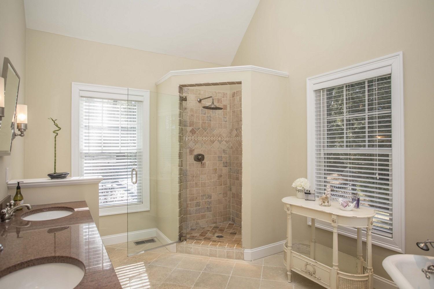 68 Shoestring Bay Road Mashpee, MA 02649 - Photo 13 of 30 a bathroom with a toilet a sink and shower