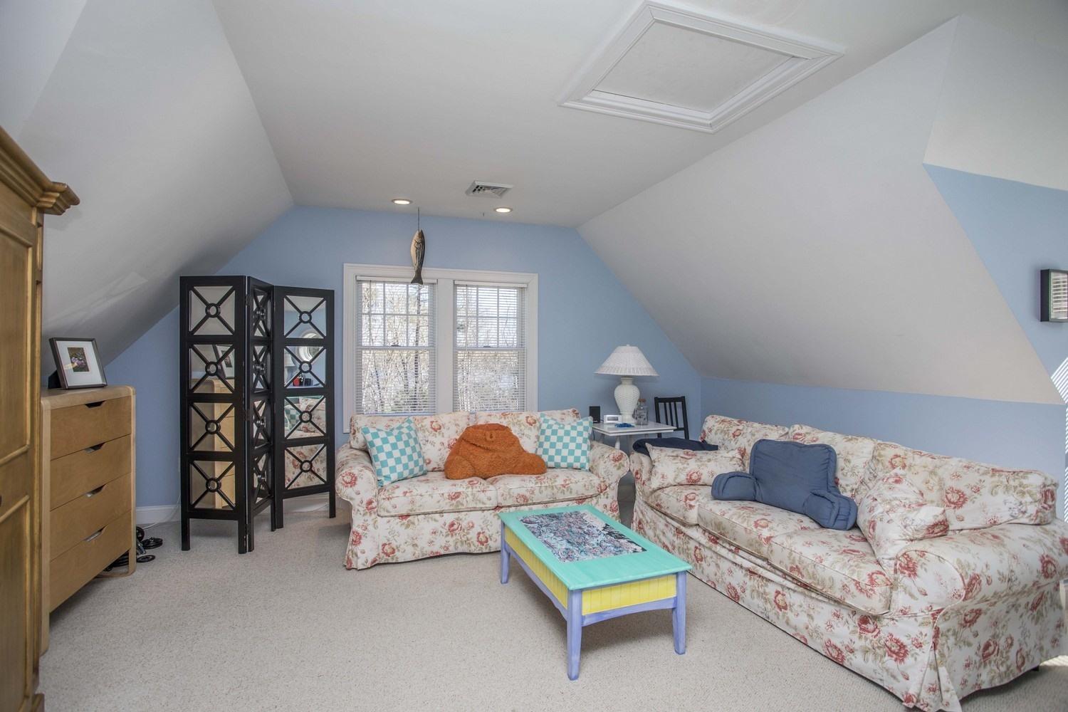 68 Shoestring Bay Road Mashpee, MA 02649 - Photo 18 of 30 a living room with furniture and a window