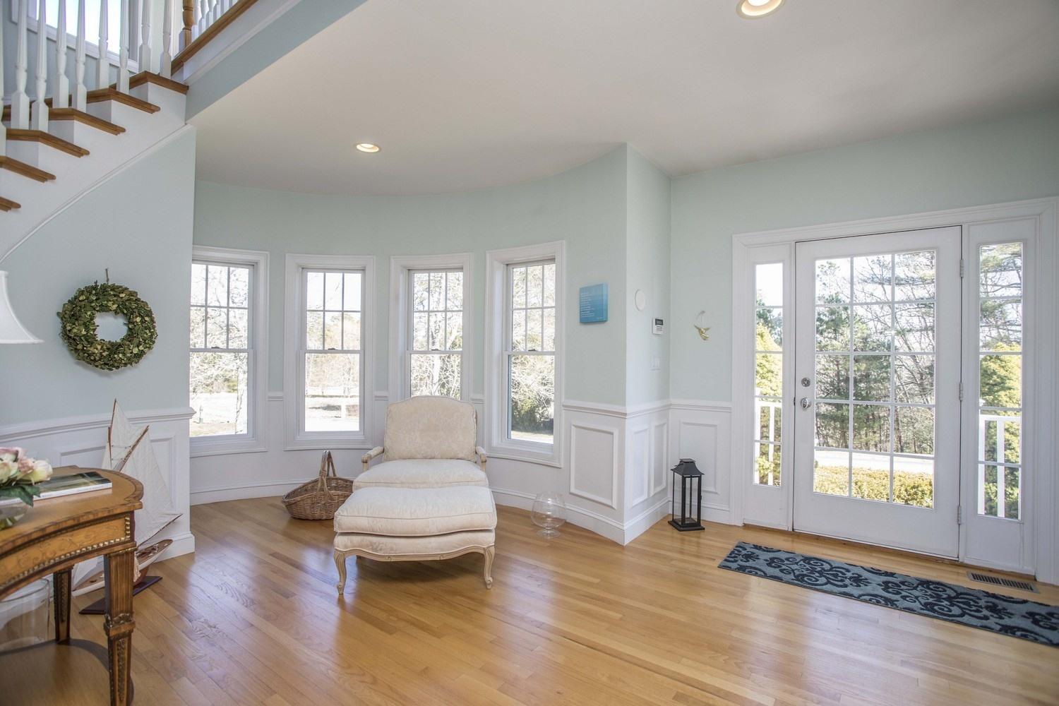 68 Shoestring Bay Road Mashpee, MA 02649 - Photo 2 of 30 a living room with furniture and a large window