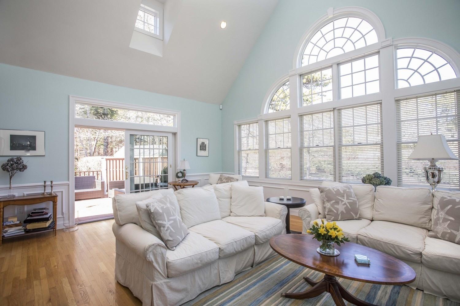 68 Shoestring Bay Road Mashpee, MA 02649 - Photo 8 of 30 a living room with furniture and a large window