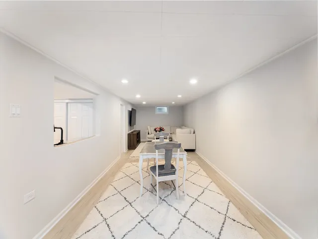 a view of a chairs and table in a room
