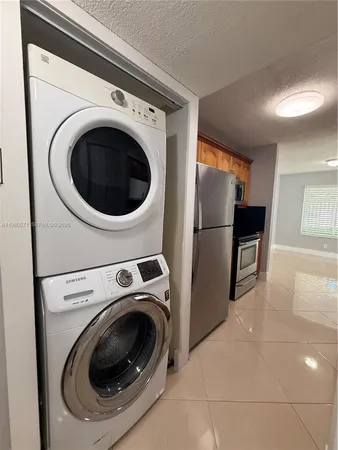 a bathroom with a sink a toilet and bathtub