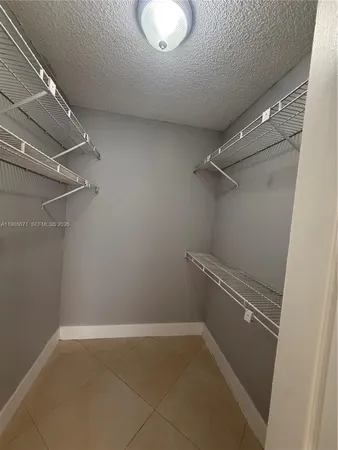 a bathroom with a glass door