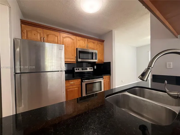 a view of a lake with a house