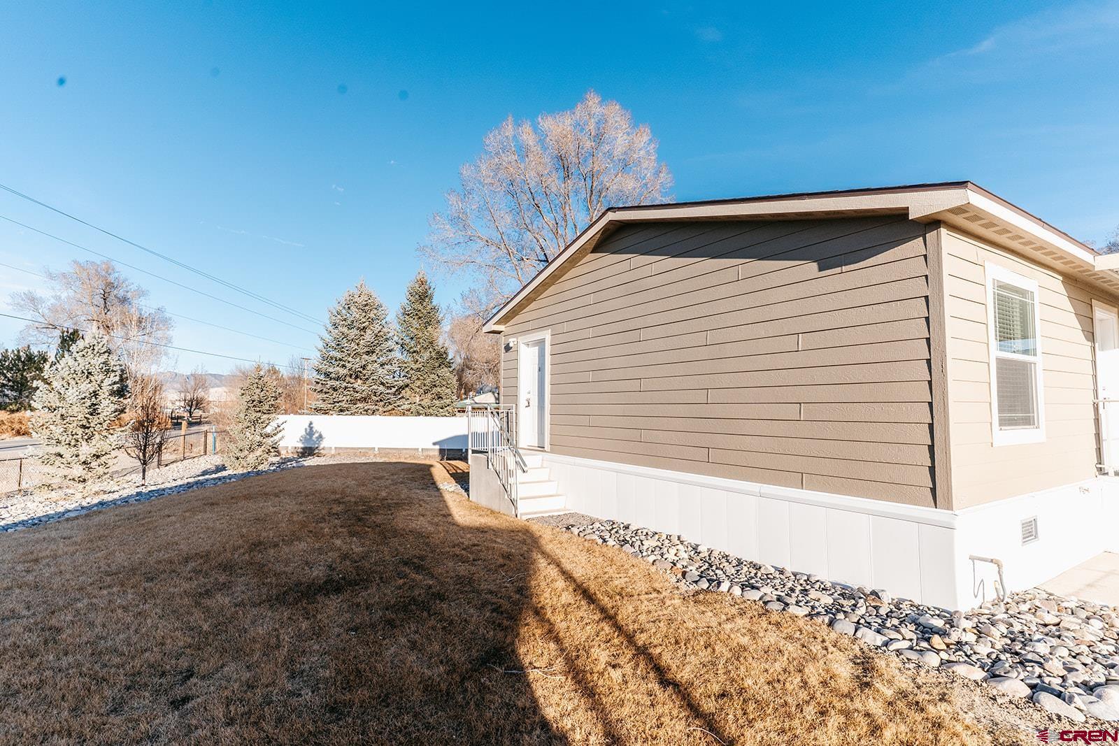 62650 Lasalle Road, Unit 343 Montrose, CO 81403 - Photo 4 of 24 a front view of a house