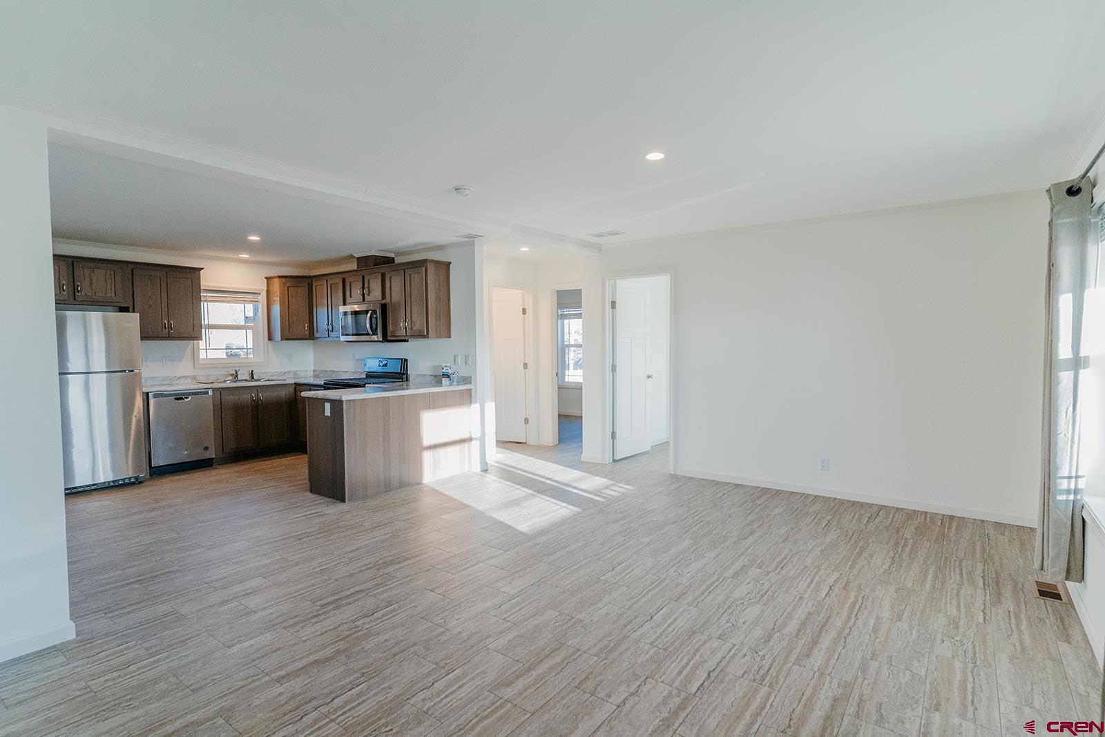 62650 Lasalle Road, Unit 343 Montrose, CO 81403 - Photo 5 of 24 a view of kitchen with wooden floor