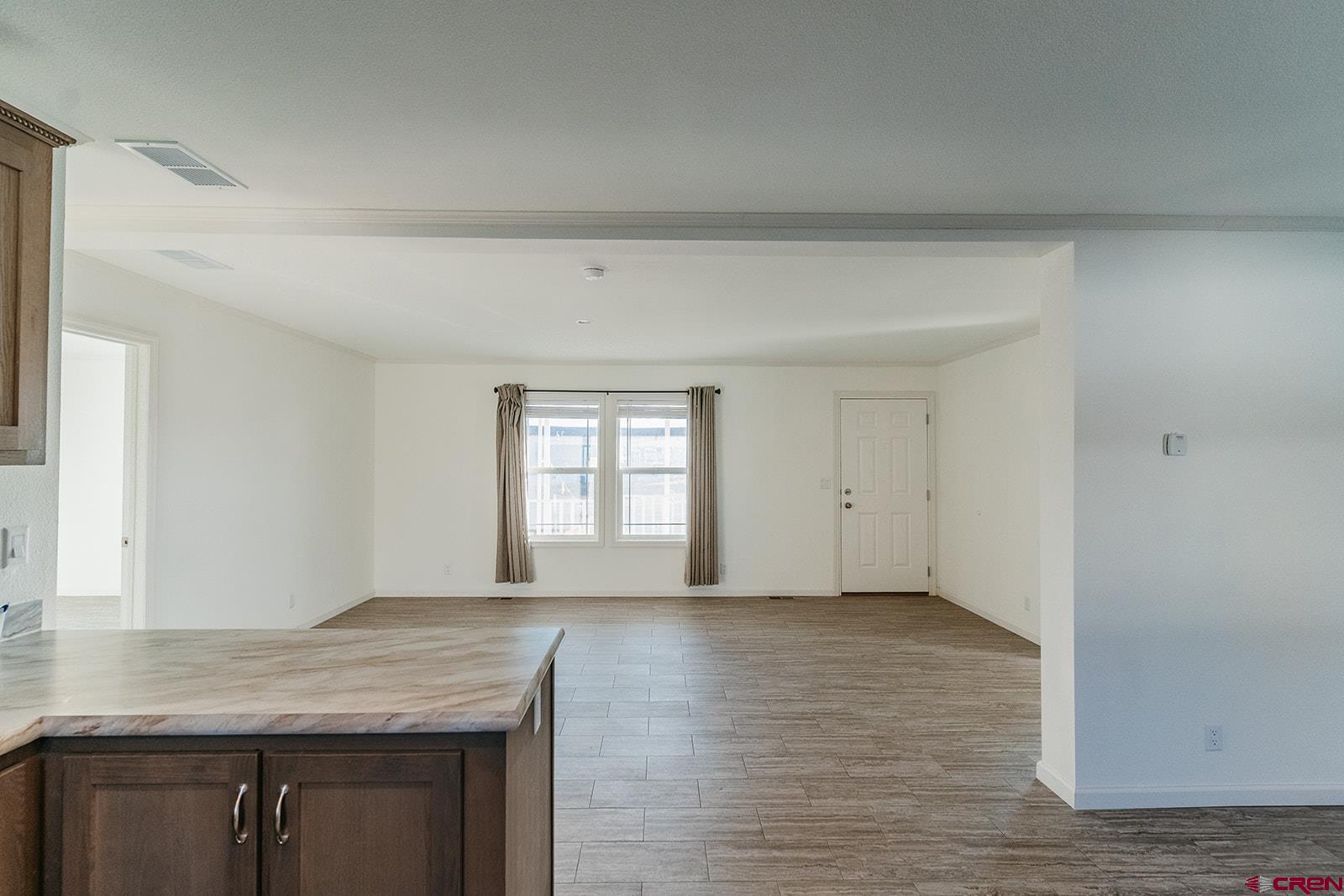 62650 Lasalle Road, Unit 343 Montrose, CO 81403 - Photo 9 of 24 a view of an empty room and window