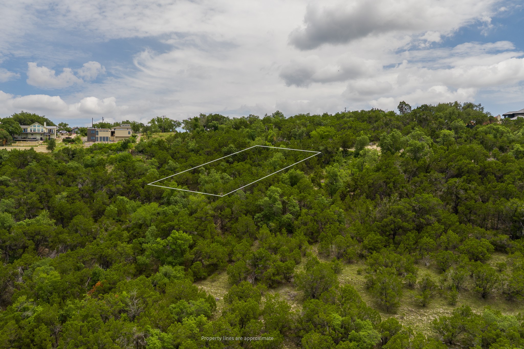 8220 Bar K Ranch Road Lago Vista, TX 78645 - Photo 8 of 8 A spacious, tree-covered parcel of land awaits your vision.