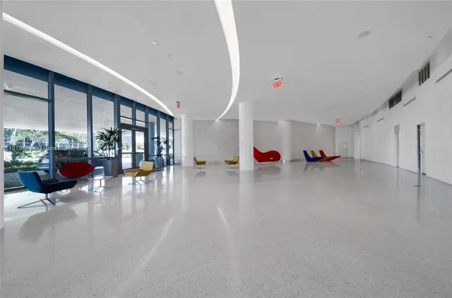 a view of an entryway and an empty room