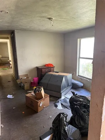 a bathroom with a sink a toilet and bathtub
