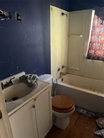 a room with furniture and a window