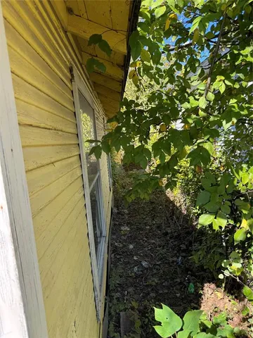 a room with gym equipment and a window