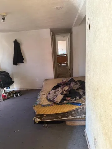 a room with gym equipment and a mirror