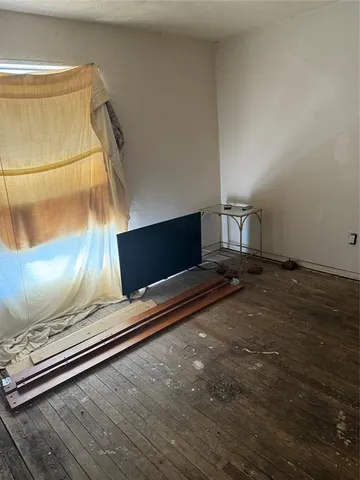 a kitchen with a stove and a refrigerator