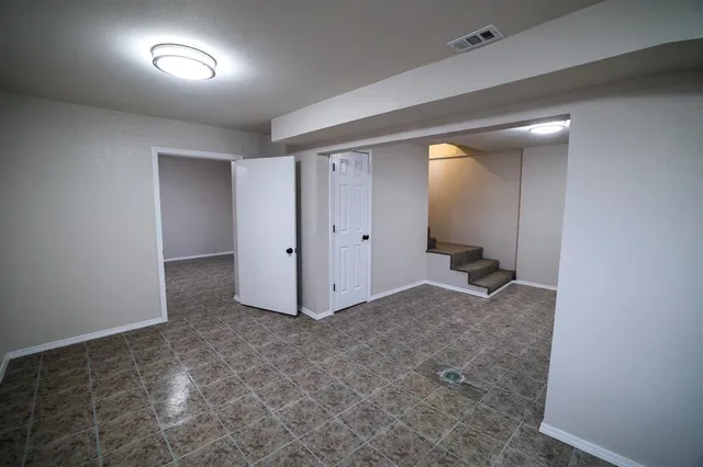 an empty room with windows