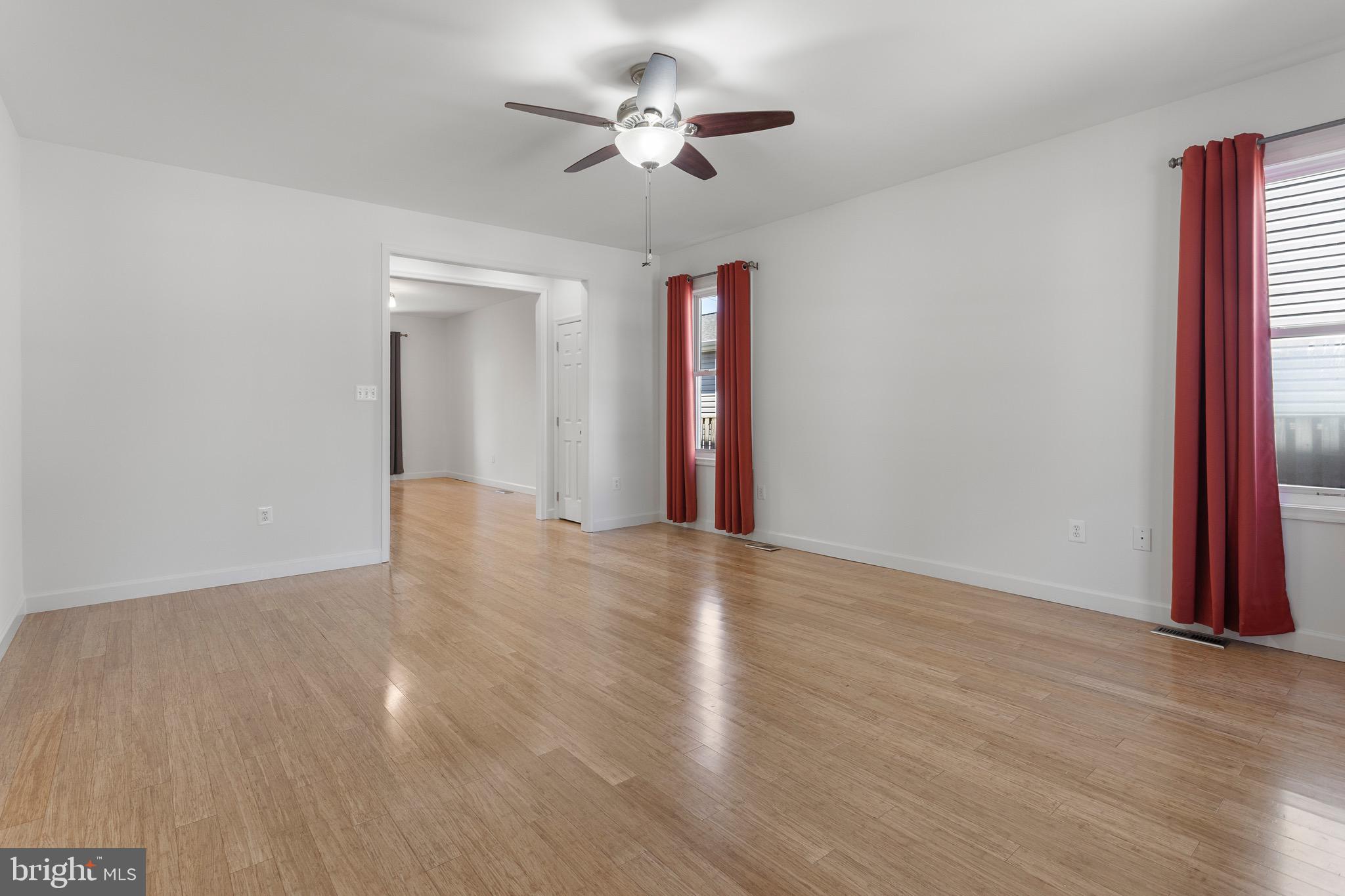 4005 7th Street North Beach, MD 20714 - Photo 17 of 47 a view of an empty room with a window