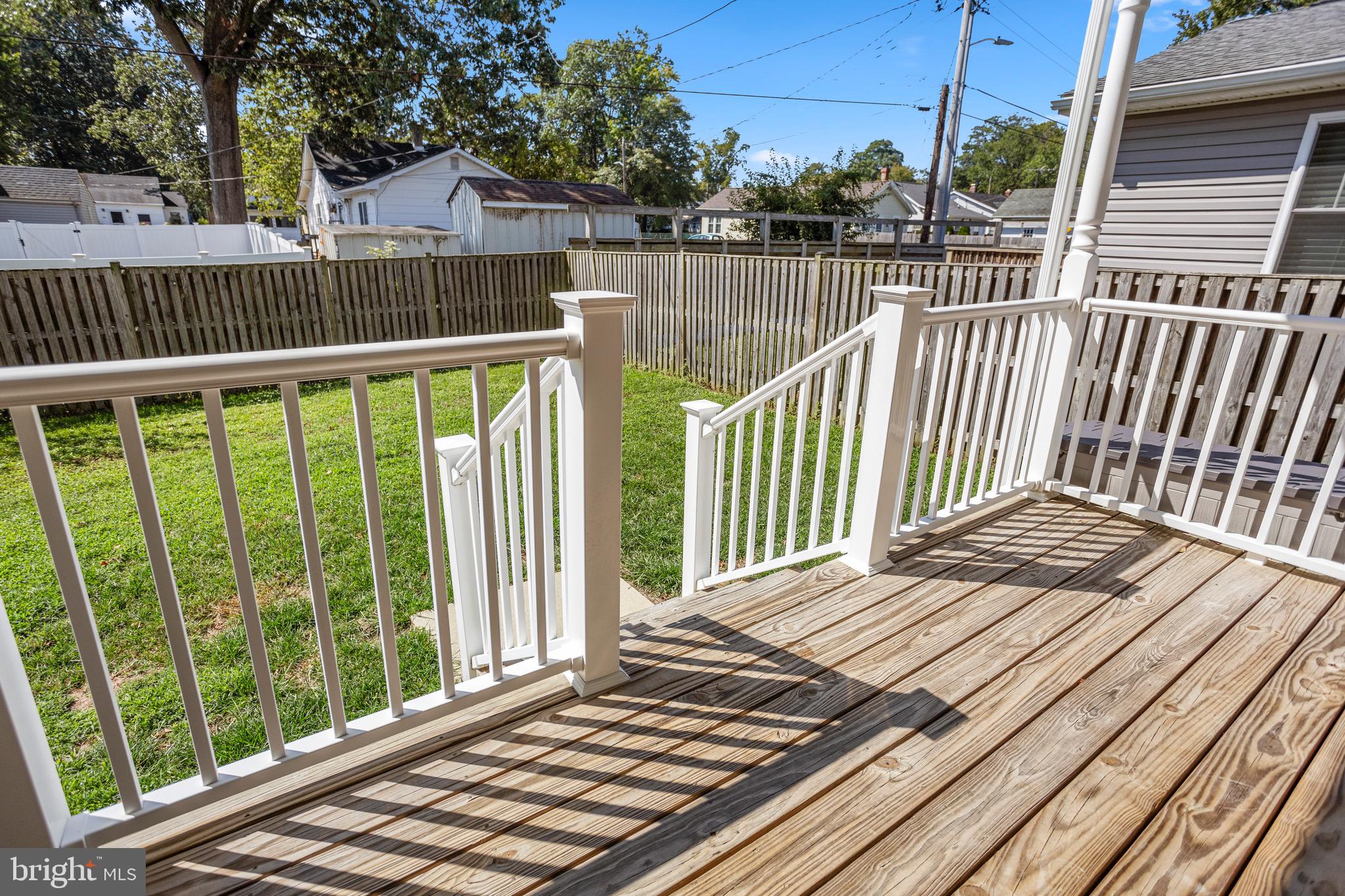 4005 7th Street North Beach, MD 20714 - Photo 37 of 47 a view of a wooden deck