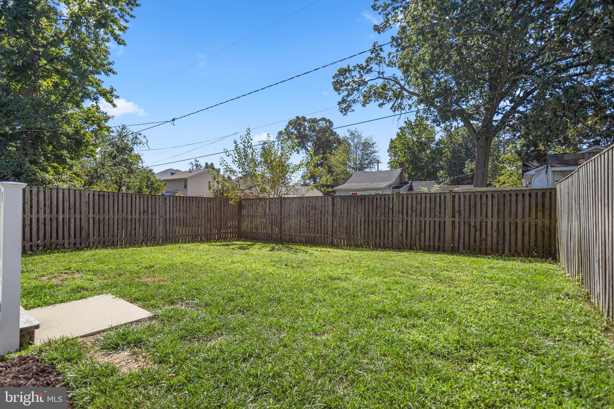 4005 7th Street North Beach, MD 20714 - Photo 39 of 47 a view of a backyard with wooden fence