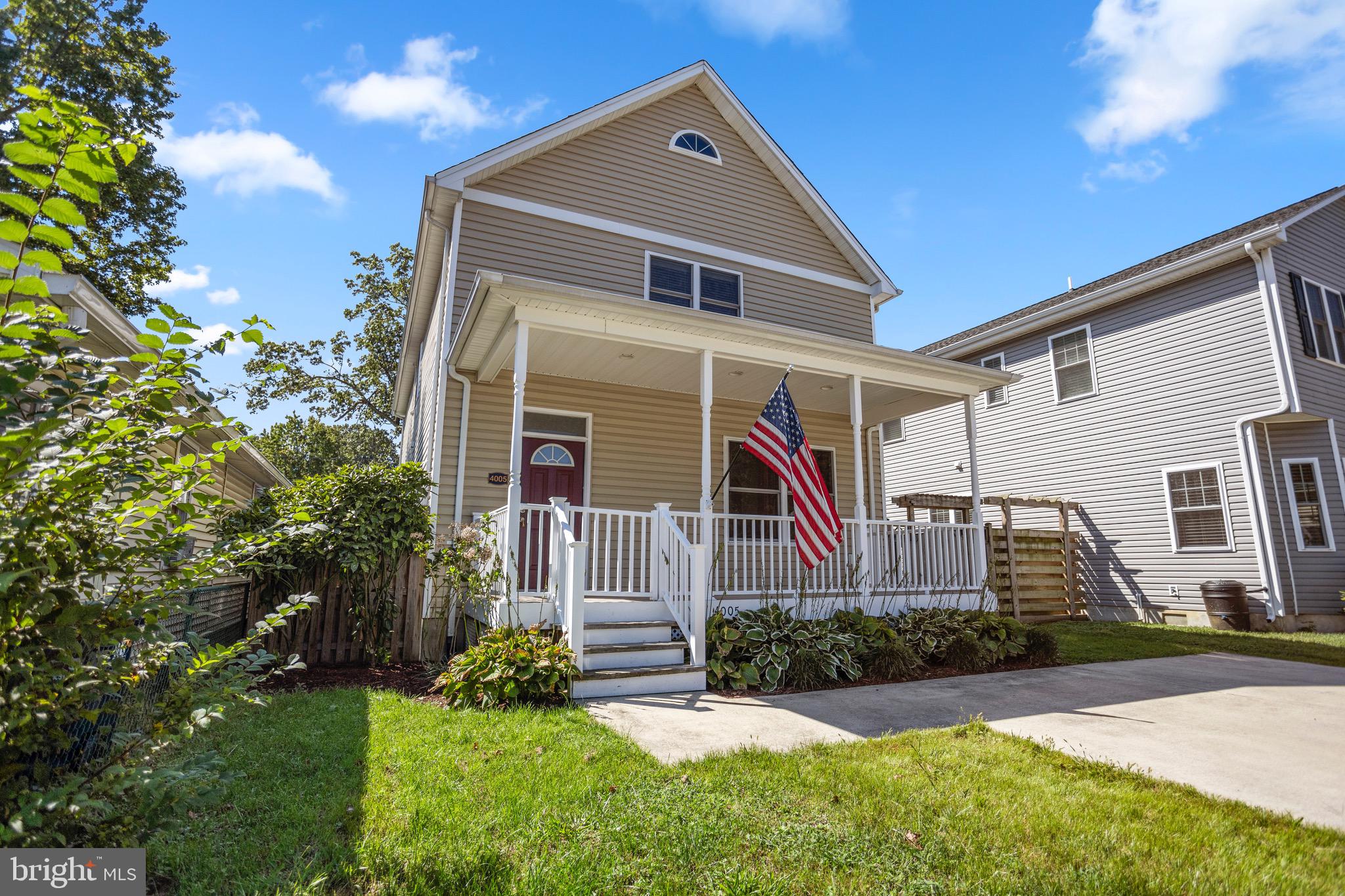 4005 7th Street North Beach, MD 20714 - Photo 4 of 47 front view of house with a yard