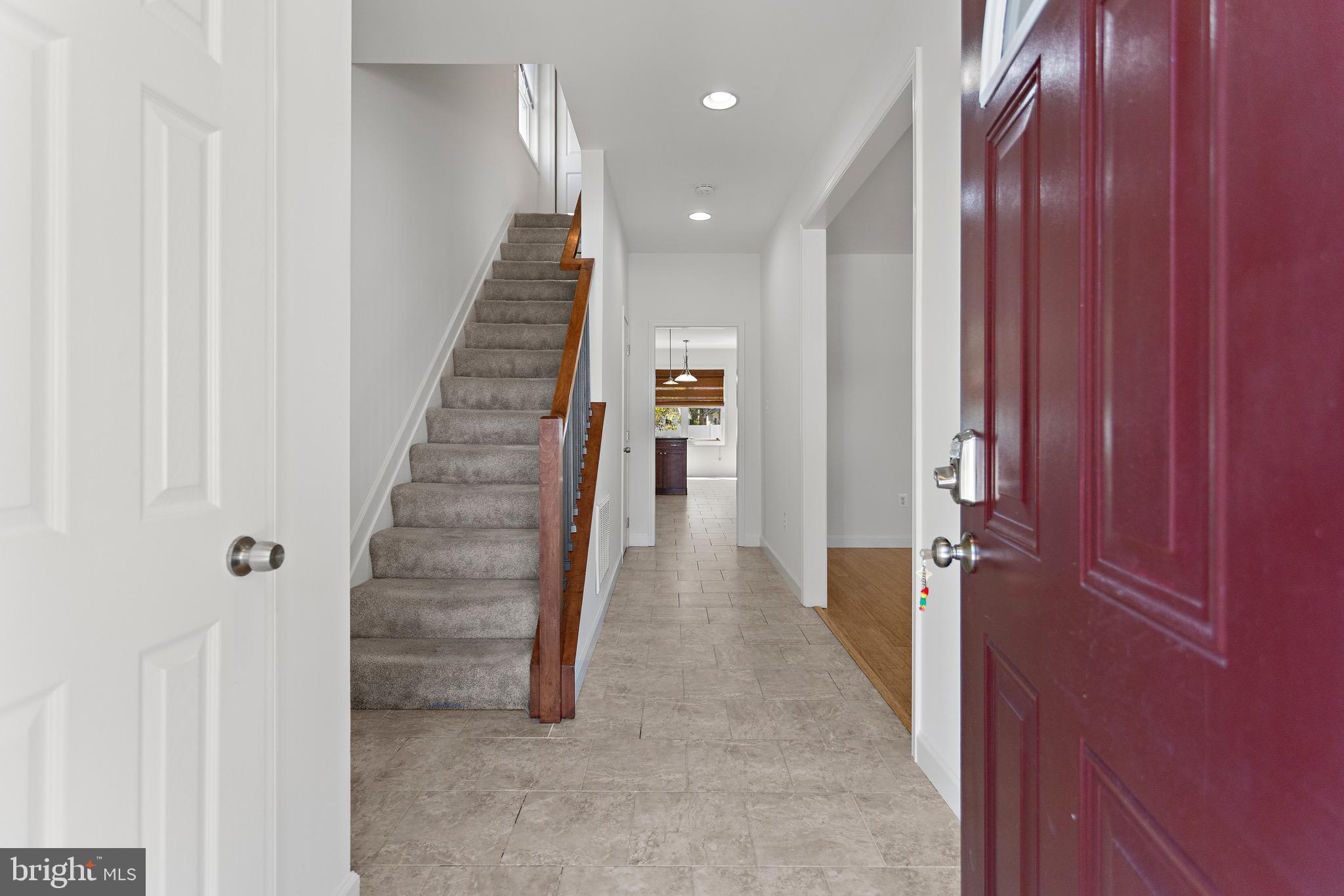 4005 7th Street North Beach, MD 20714 - Photo 6 of 47 a view of a hallway with stairs