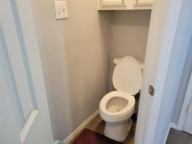 a close view of a toilet in a bathroom