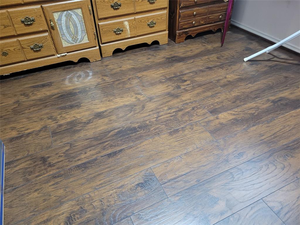 5565 Preston Oaks Road, Unit 117 Dallas, TX 75254 - Photo 21 of 24 a view of a room with wooden floor