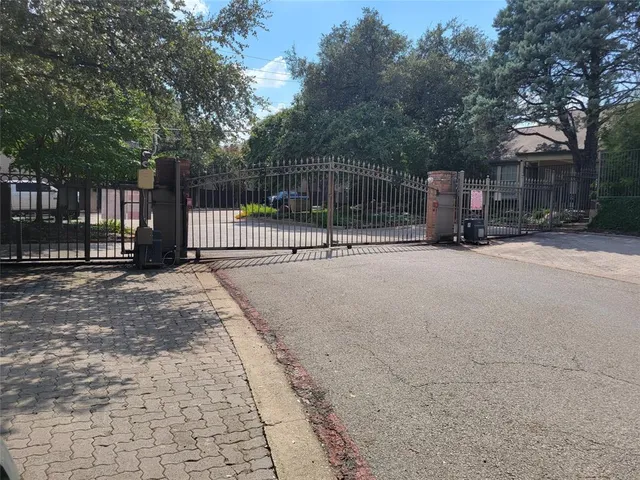 a view of a patio with a tree