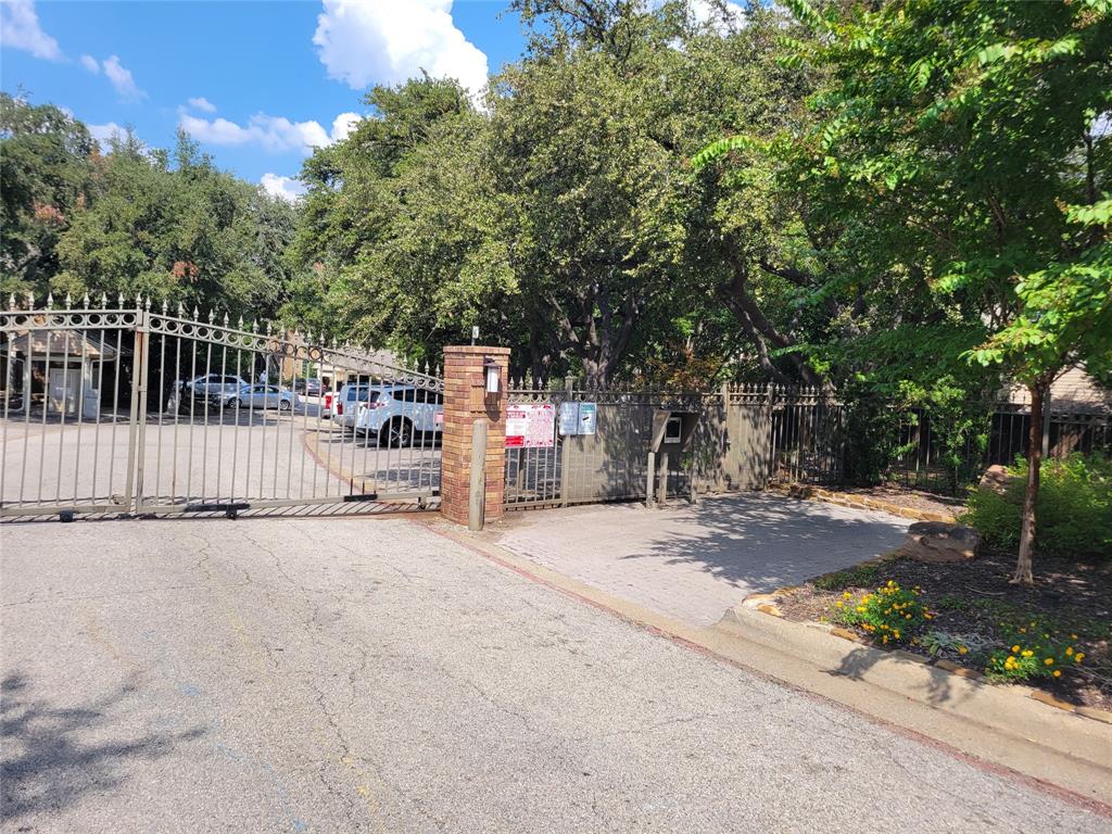 5565 Preston Oaks Road, Unit 117 Dallas, TX 75254 - Photo 24 of 24 a view of a patio with a tree