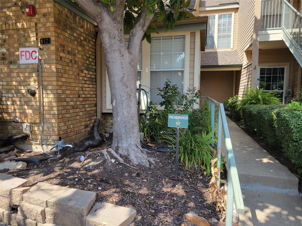5565 Preston Oaks Road, Unit 117 Dallas, TX 75254 - Photo 5 of 24 a view of a back yard of the house