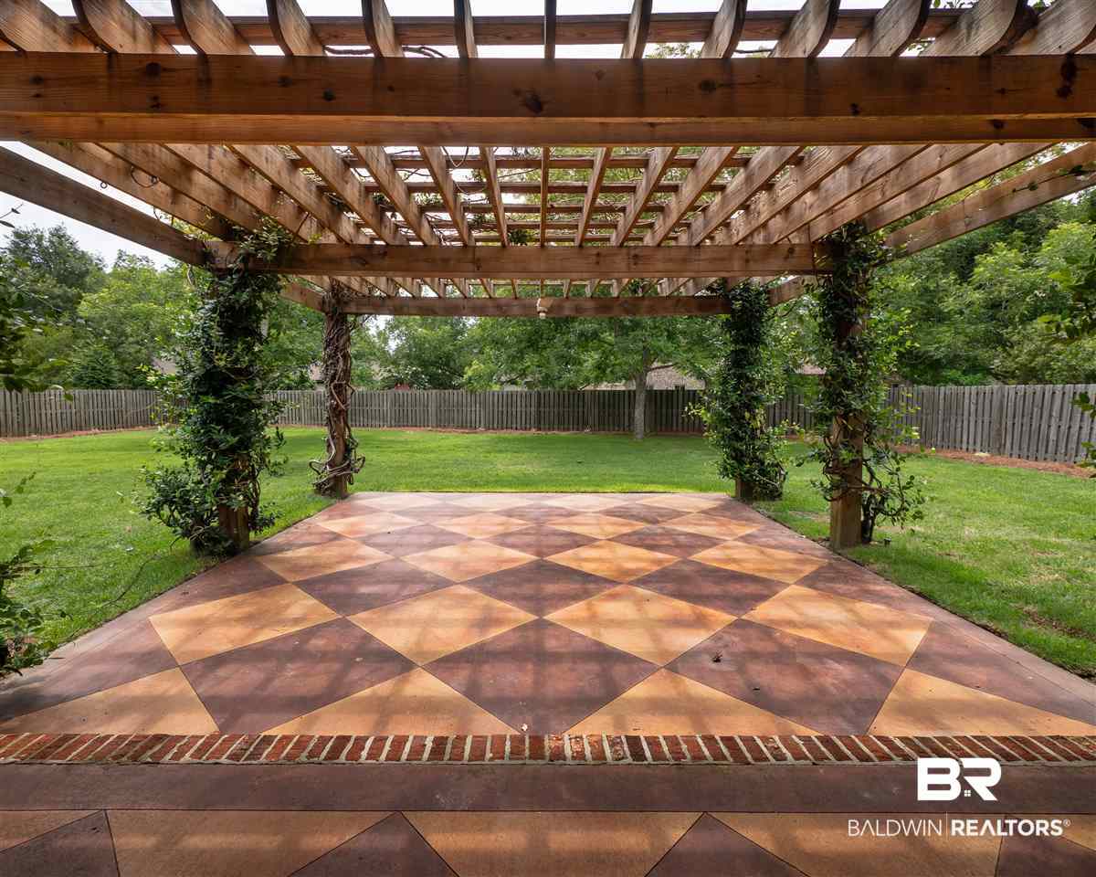 379 Lambton Street Fairhope, AL 36532 - Photo 16 of 25 20 ft pergola with shade and scored floors