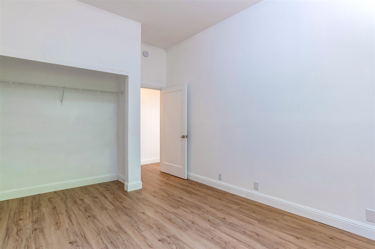 238 South Holokai Road Haiku, HI 96708 - Photo 25 of 28 a view of an empty room with wooden floor