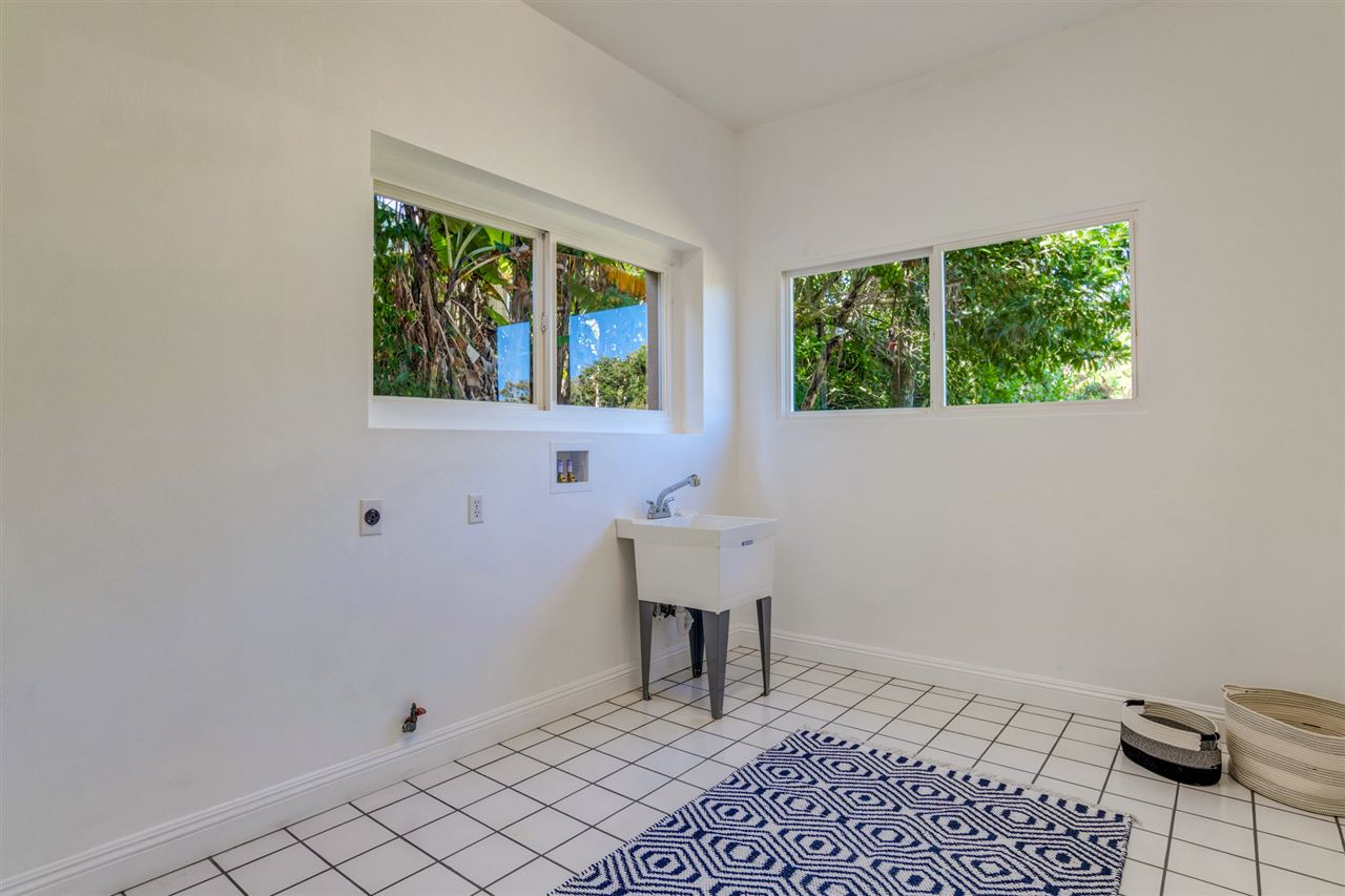 238 South Holokai Road Haiku, HI 96708 - Photo 26 of 28 a view of a room that has a window and chair