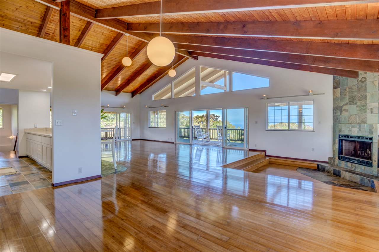238 South Holokai Road Haiku, HI 96708 - Photo 8 of 28 a living room with furniture and a wooden floor