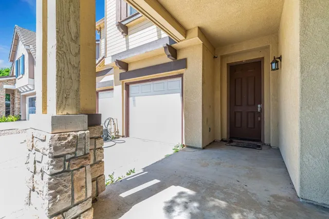 a view of balcony with furniture