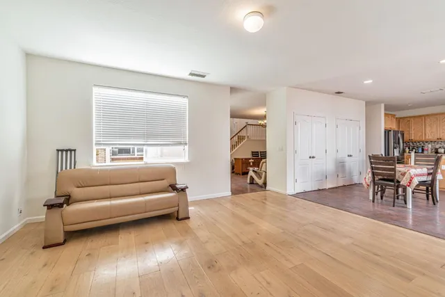 a living room with furniture and a table