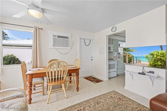 a view of a dining room with furniture