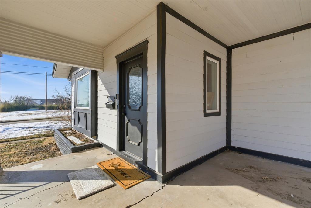 1317 4th Street Graham, TX 76450 - Photo 2 of 25 Property entrance featuring covered porch