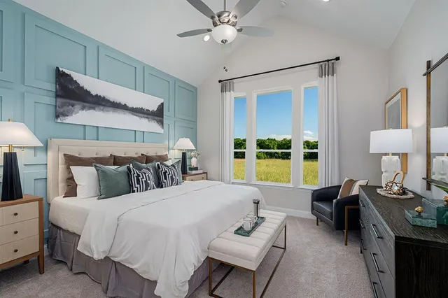 a bed room with a bed and a night stand