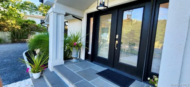 a view of a entryway door front of house