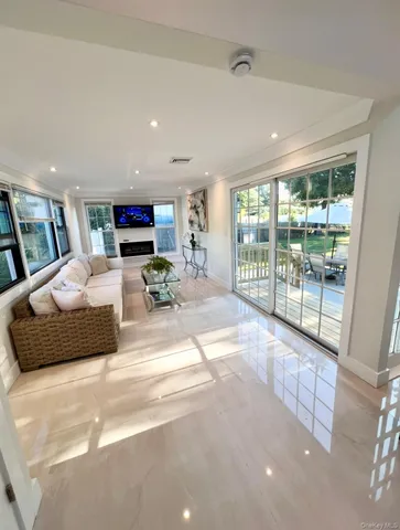 a kitchen with white cabinets and appliances