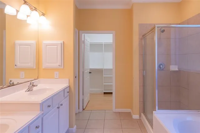 a bathroom with a sink a mirror and a bathtub