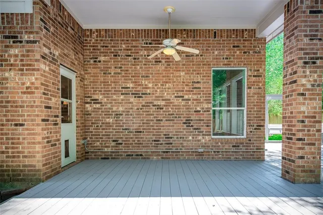 a view of outdoor space and wooden floor