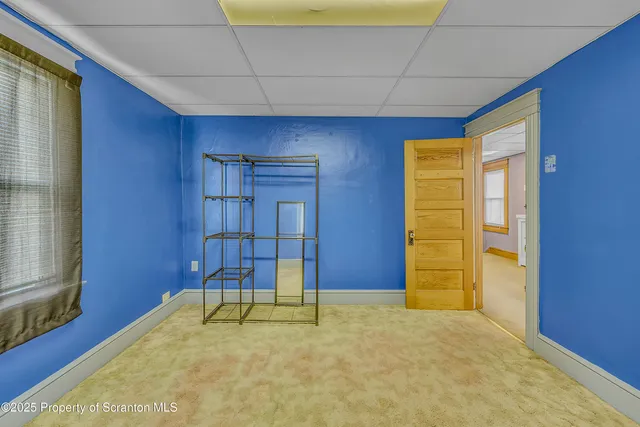 a view of an empty room with window