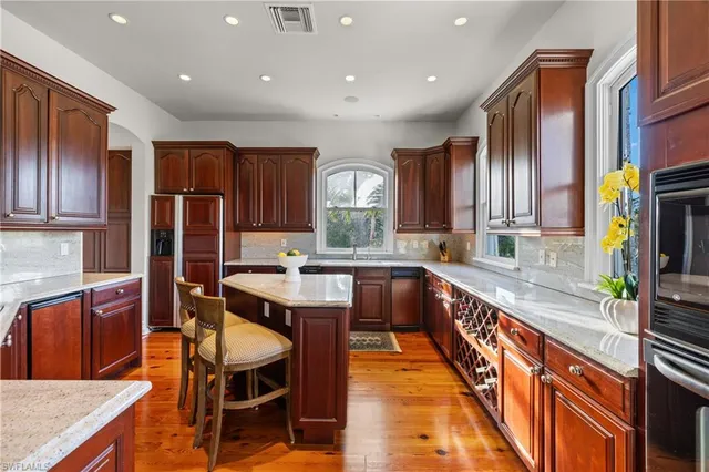 a view of a balcony with wooden floor