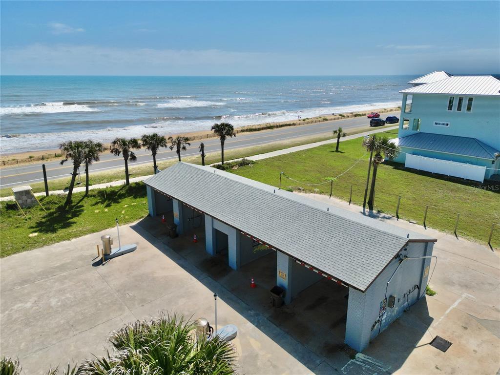 2299 North Ocean Shore Boulevard Flagler Beach, FL 32136 - Photo 6 of 12 swimming pool view with a garden space