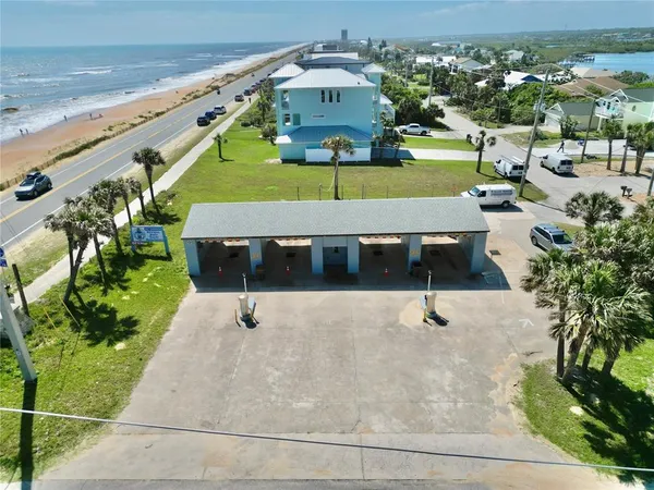 a view of a swimming pool with a yard