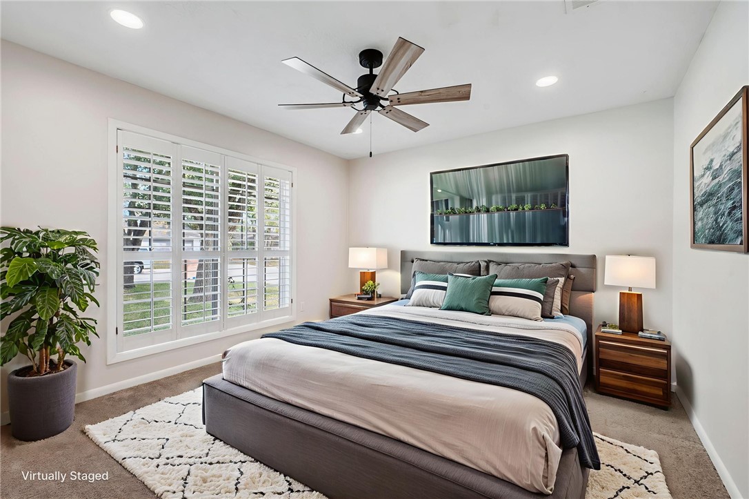 2810 Hillside Drive Bryan, TX 77802 - Photo 13 of 22 a bedroom with a large bed and a window