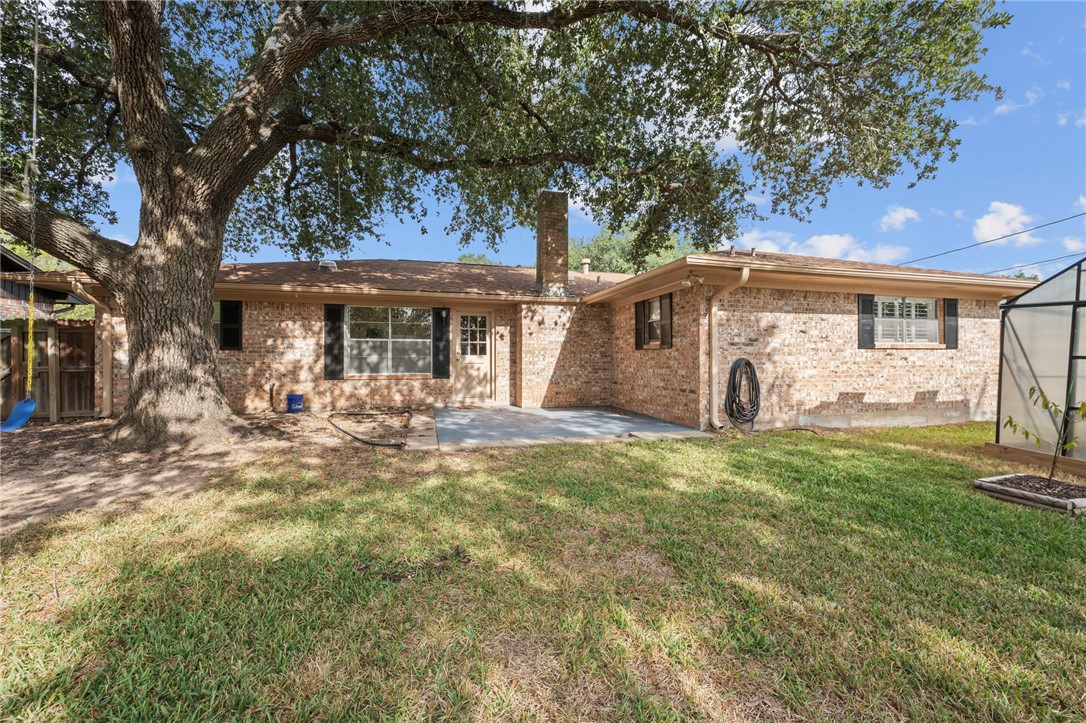 2810 Hillside Drive Bryan, TX 77802 - Photo 18 of 22 a front view of a house with garden